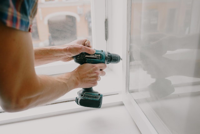 fixing a window with a drill